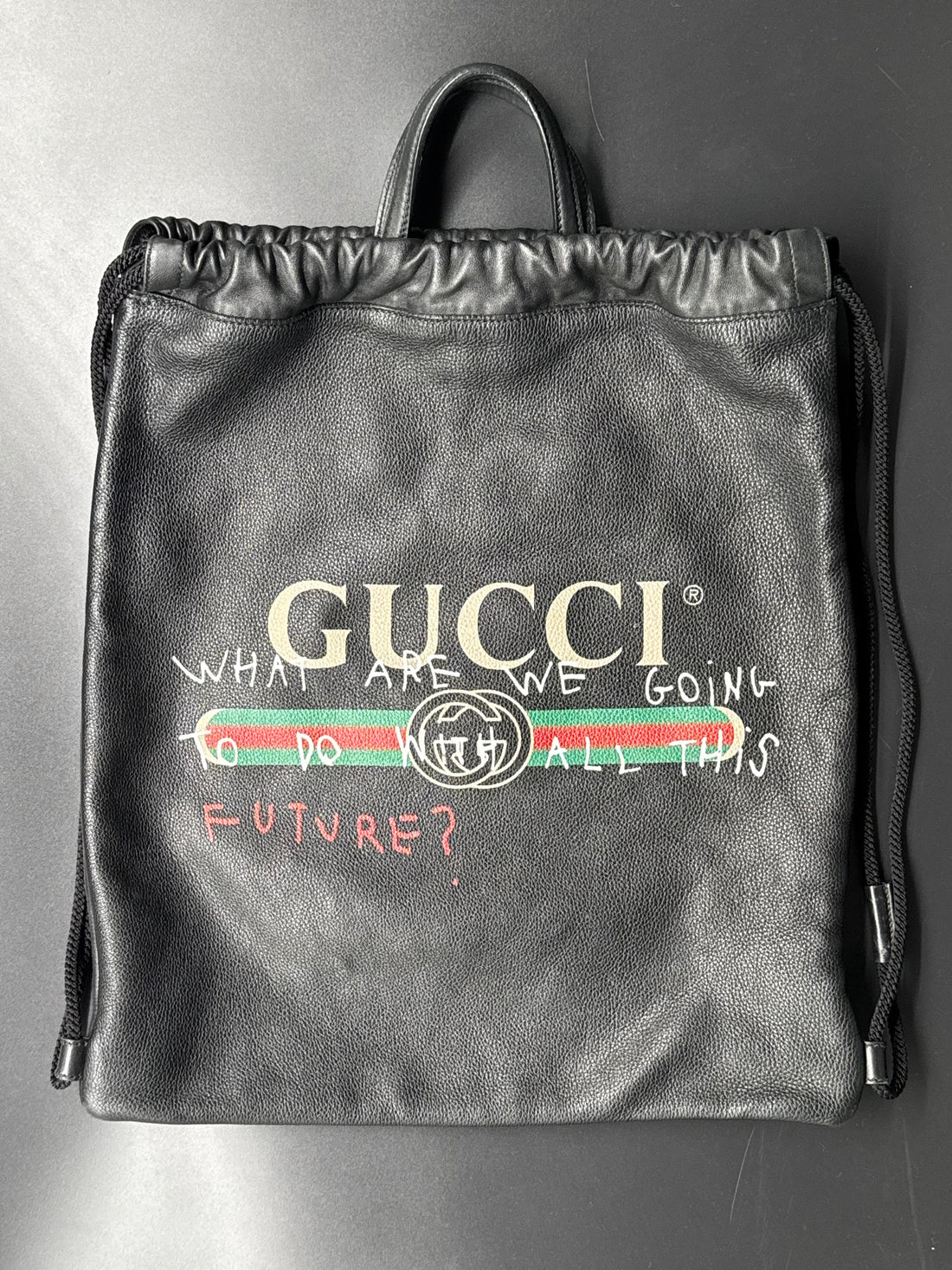 Gucci Capitan Logo Drawstring Backpack